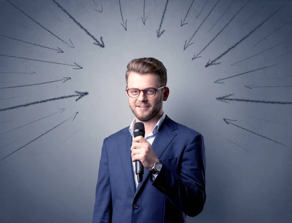 Businessman holding microphone — Stock Photo, Image