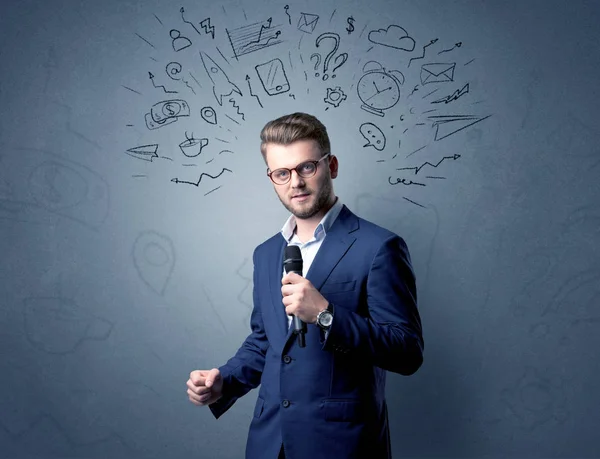 Businessman holding microphone — Stock Photo, Image