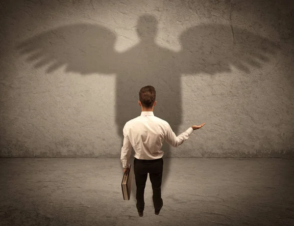 Vendedor honesto con concepto de sombra de ángel —  Fotos de Stock