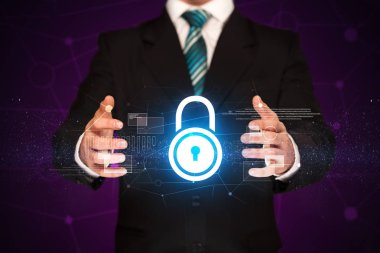 Kilit grafik tutan işadamı 