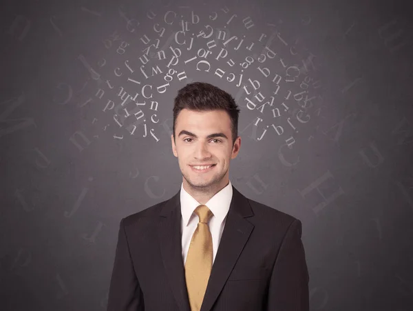 Businessman with alphabet — Stock Photo, Image