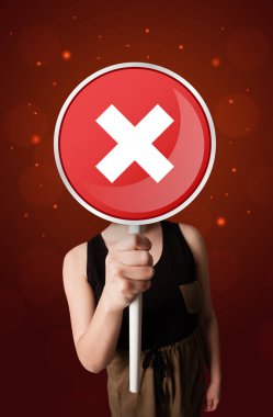 Tutan kadın x işareti