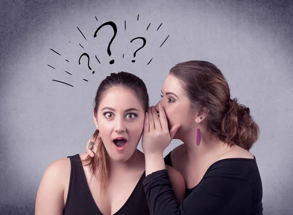 Girl telling secret things to her girlfriend — Stock Photo, Image