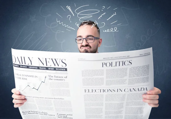 Businessman reading newspaper — Stock Photo, Image