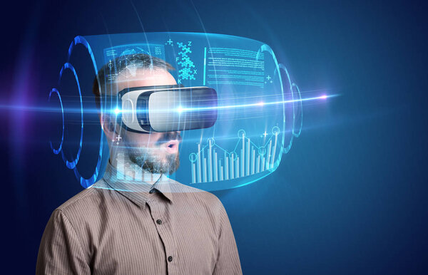 Businessman with virtual reality goggles