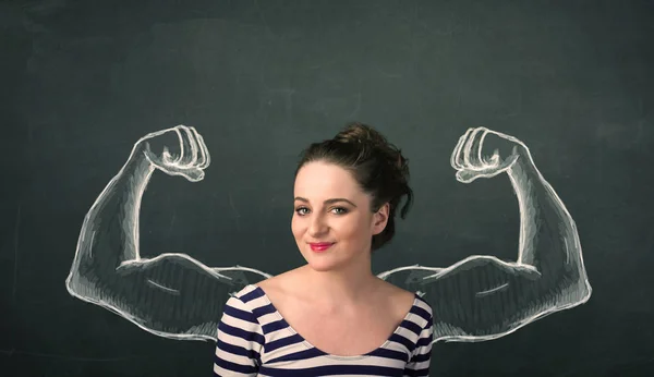 Mujer con brazos fuertes y musculosos dibujados — Foto de Stock