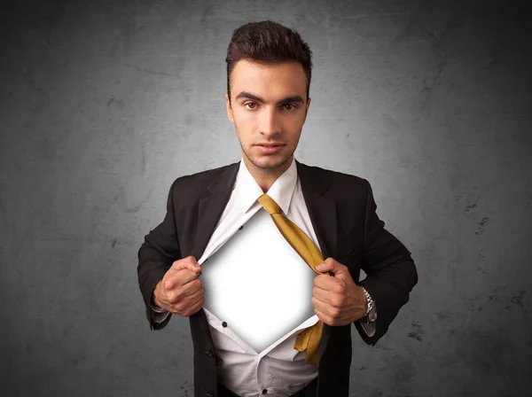 Businessman tearing off his shirt with white copyspace on chest — Stock Photo, Image