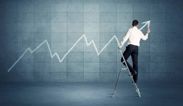 Man drawing line from ladder — Stock Photo, Image