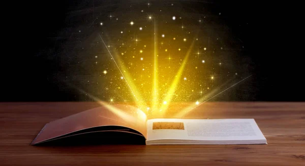 Yellow lights over book — Stock Photo, Image