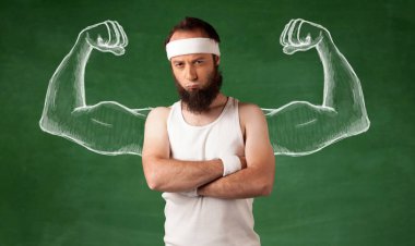 Sıska genç adam çalışıyor.