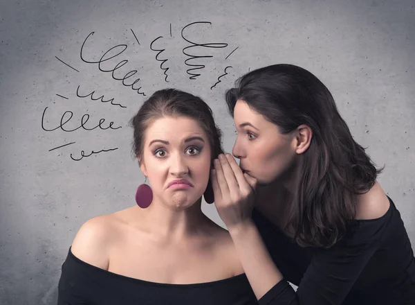 Girl telling secret things to her girlfriend — Stock Photo, Image