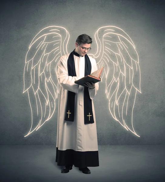 Young priest in giving his blessing — Stock Photo, Image