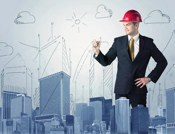 Joven trabajador dibujando una ciudad vista — Foto de Stock