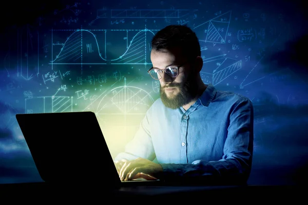 Businessman in the office at night — Stock Photo, Image