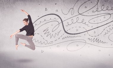 Bale dansçısı çizgiler ve oklarla sanat dansı yapıyor.