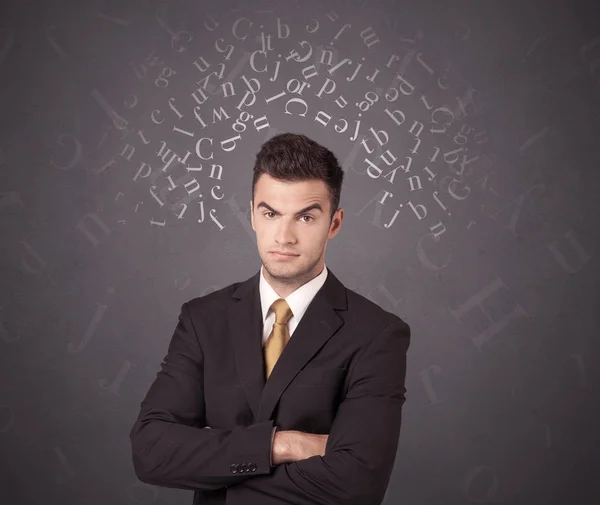 Businessman with alphabet — Stock Photo, Image