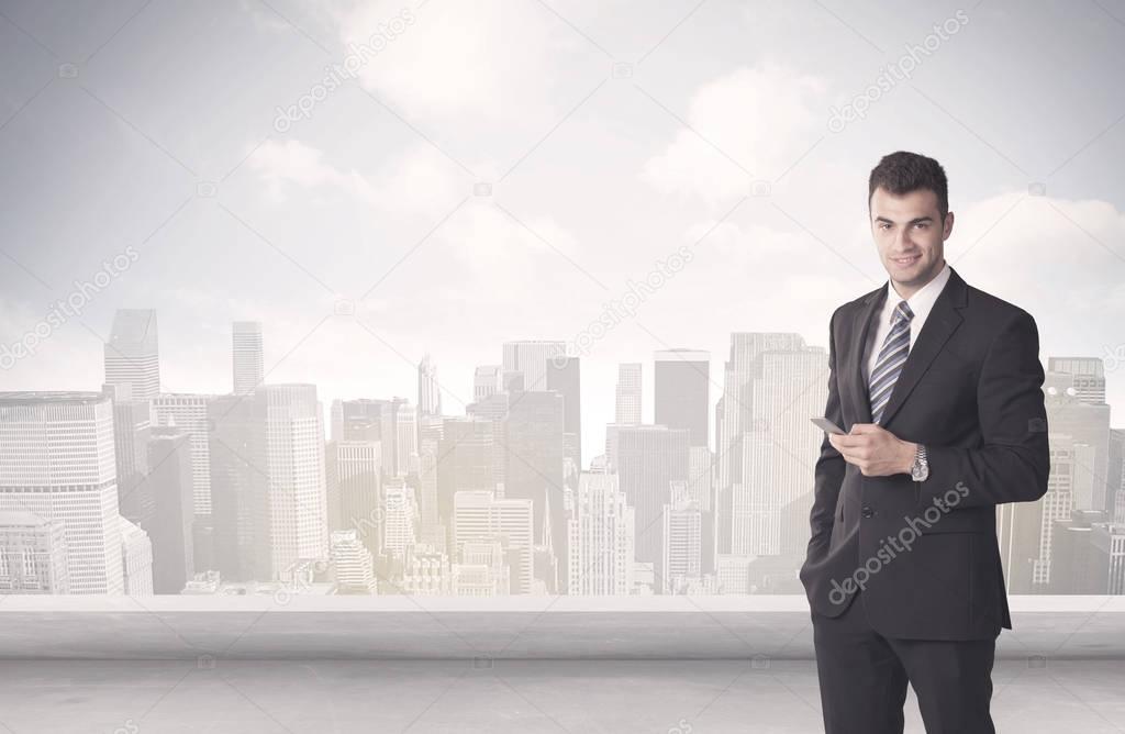 Sales person talking in front of city scape