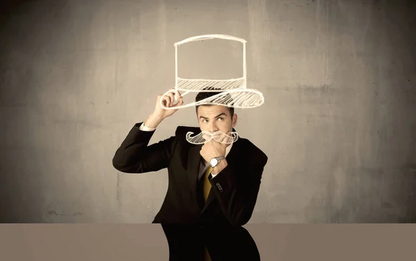 Salesman drawing hat and mustache — Stock Photo, Image