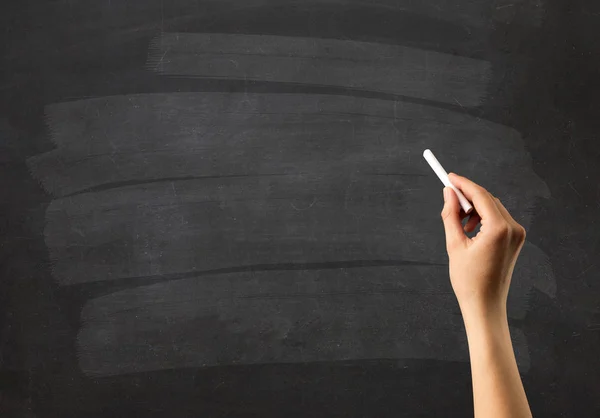 Hand holding chalk — Stock Photo, Image