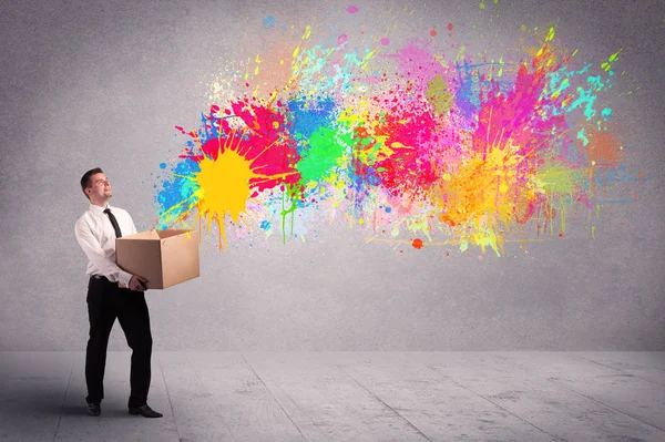 Colour splatter from box — Stock Photo, Image