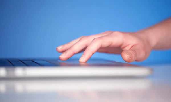 Close up of hand pressing keyboard buttons — Stock Photo, Image