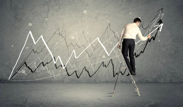 Man on ladder drawing lines — Stock Photo, Image