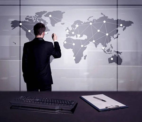 Business person drawing dots on world map — Stock Photo, Image