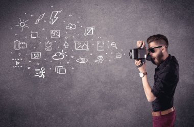 Sakallı, fotoğraf öğrenen zarif bir adam.