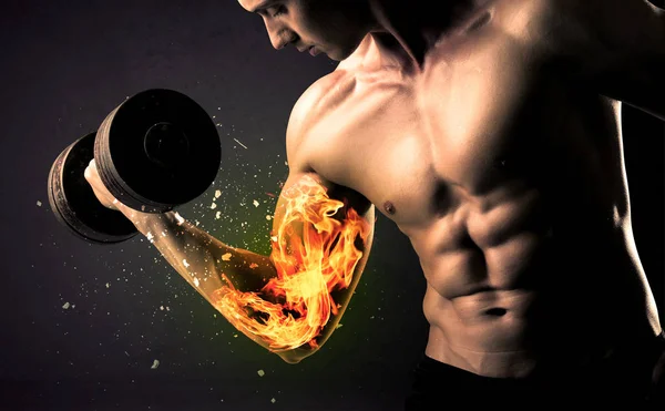 Bodybuilder athlete lifting weight with fire explode arm concept — Stock Photo, Image