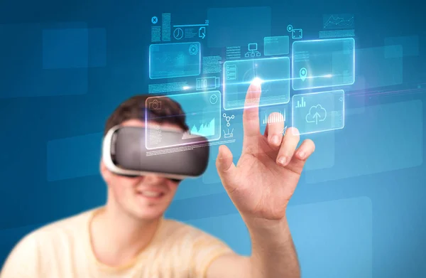 Man wearing virtual reality goggles — Stock Photo, Image