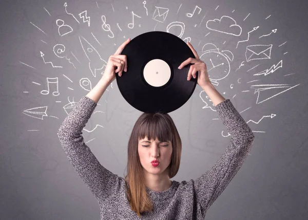 Lady vinyl record te houden — Stockfoto