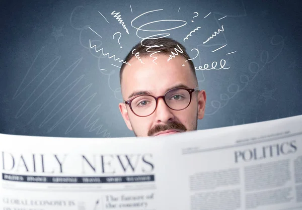 Businessman reading newspaper — Stock Photo, Image