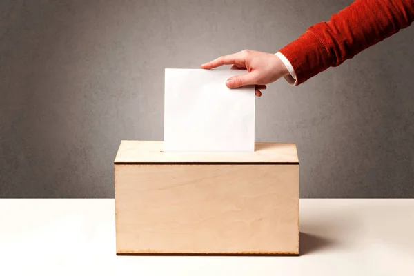 Ballot box with person casting vote — Stock Photo, Image