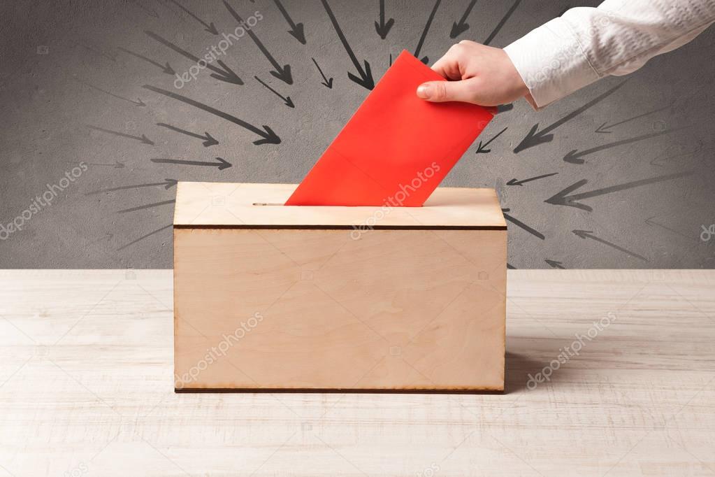 close up of a ballot box and casting vote