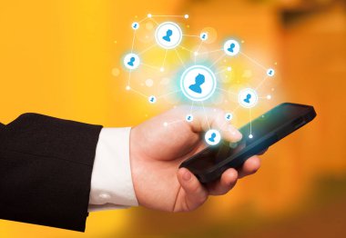 Smartphone, sosyal ağ kavramı işaret parmak