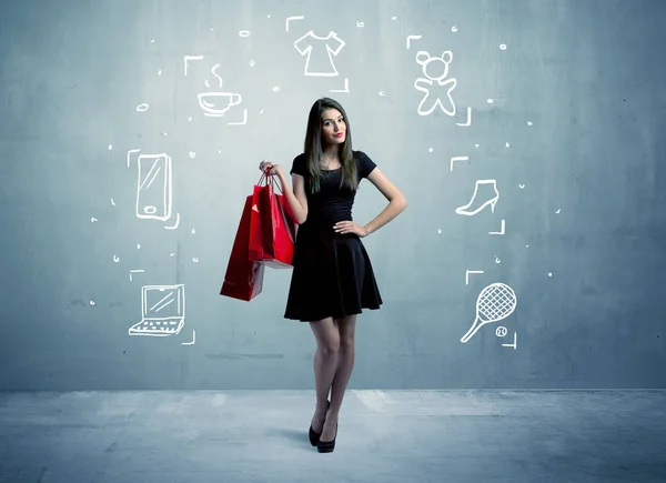 Mujer de compras con bolsos e iconos dibujados —  Fotos de Stock