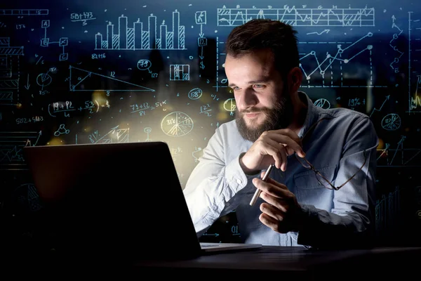 Businessman in the office at night — Stock Photo, Image