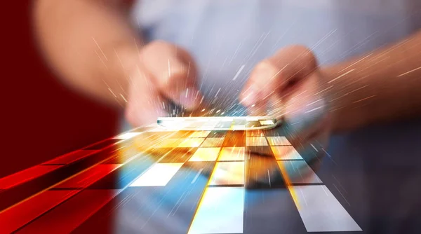 Man holding smartphone with futuristic lines — Stock Photo, Image