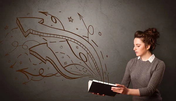 Young lady holding book with arrows — Stock Photo, Image