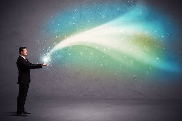 Businessman holding light