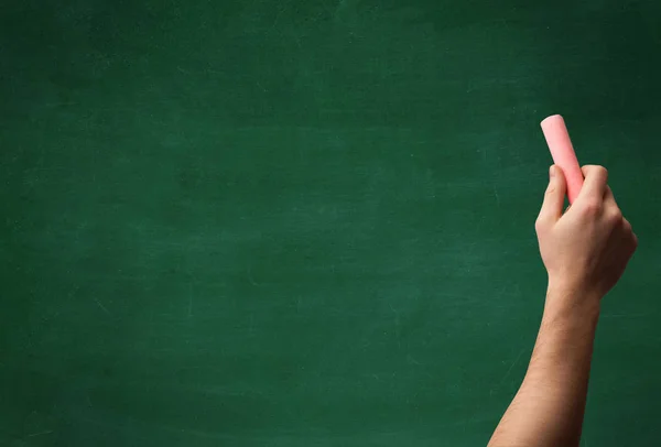 Hand writing on clean blackboard — Stock Photo, Image