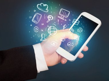 El smartphone Medya simgeler ile tutarak 