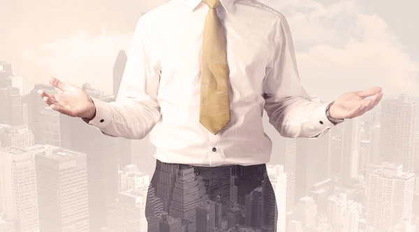 Handsome business man with overlay cityscape — Stock Photo, Image