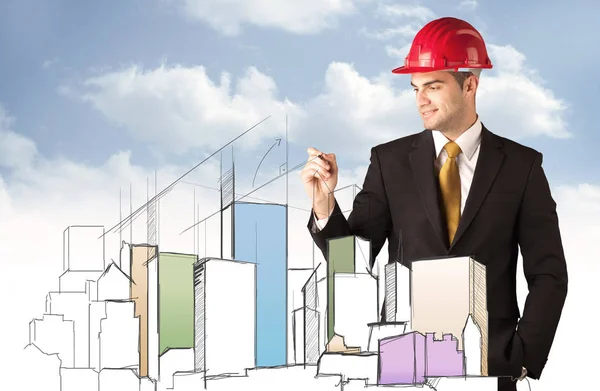 Obrero de la construcción planeando una ciudad vista — Foto de Stock