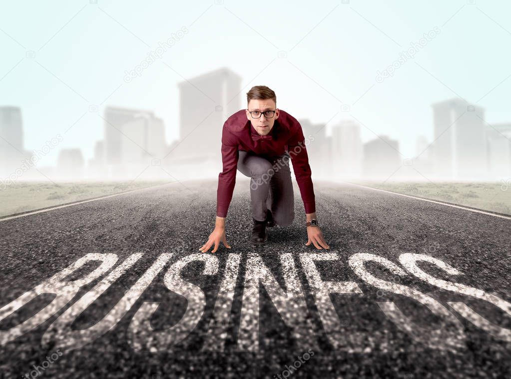 Businessman at start line