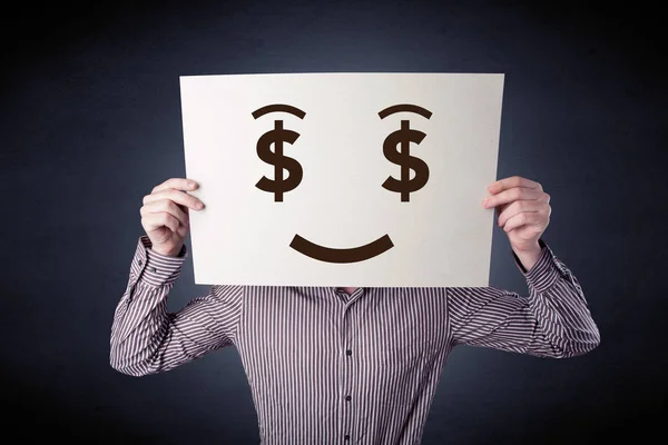 Affärsman som håller papper med giriga känslor — Stockfoto