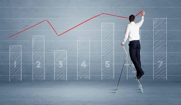Mann zeichnet Diagramm von Leiter — Stockfoto