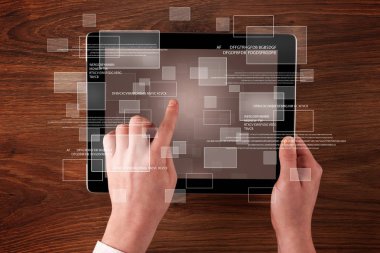 Tablet tutan eller iş
