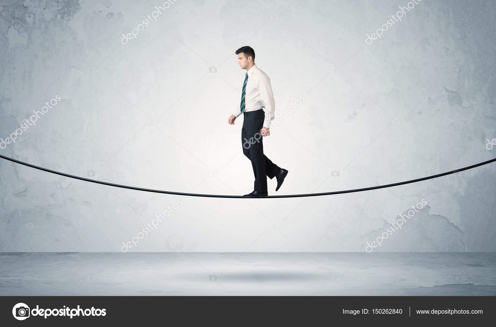 Sales guy balancing on tight rope Stock Photo by ©ra2studio 150262840