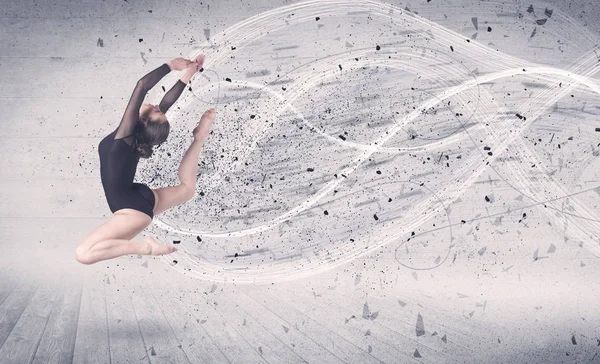Bailarina de ballet de rendimiento saltando con partículas de explosión de energía — Foto de Stock